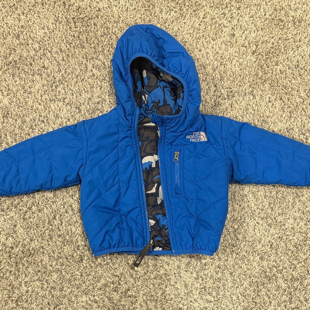 The North Face Vibrant Blue Jacket with Camo Lining
